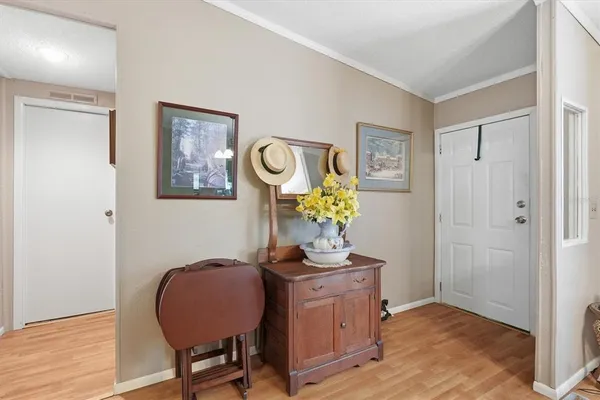 a workspace with furniture and wooden floor