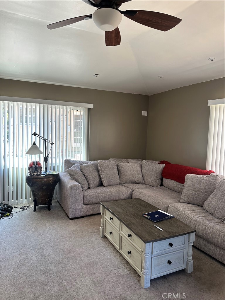 4910 Willowcrest Avenue Toluca Lake, CA 91601 - Photo 17 of 25 a living room with furniture and a large window