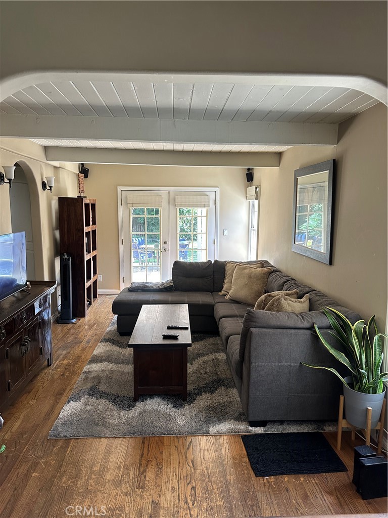 4910 Willowcrest Avenue Toluca Lake, CA 91601 - Photo 7 of 25 a living room with furniture and a potted plant