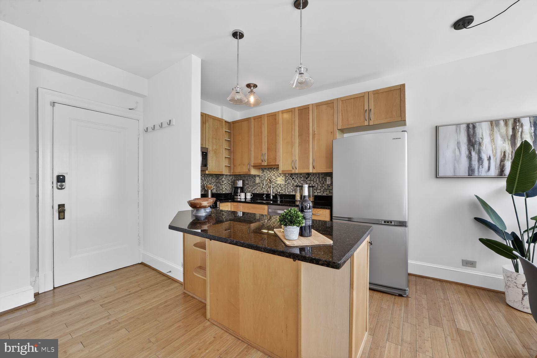 2707 Adams Mill Road Northwest, Unit 400 Washington, DC 20009 - Photo 15 of 21 Modern kitchen with sleek finishes.