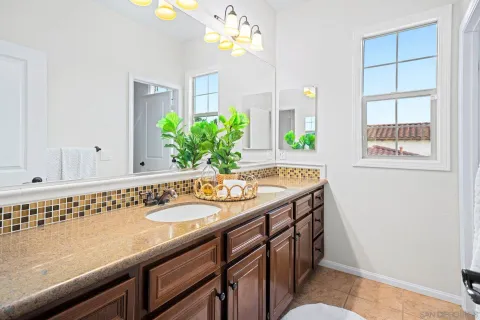 a view of a terrace with furniture and garden