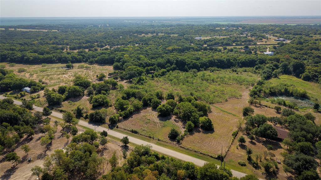 Tbd Stacks Road Ennis, TX 75119 - Photo 7 of 24 Expansive land parcel featuring open fields and mature tree coverage