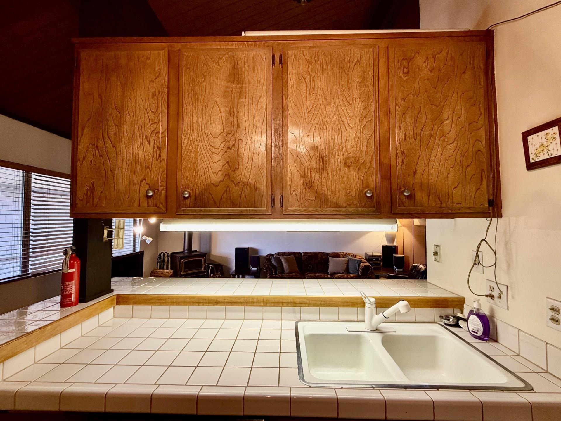 165 Old Mammoth Road, Unit 105 Mammoth Lakes, CA 93546 - Photo 15 of 17 a view of a kitchen with a sink and a window