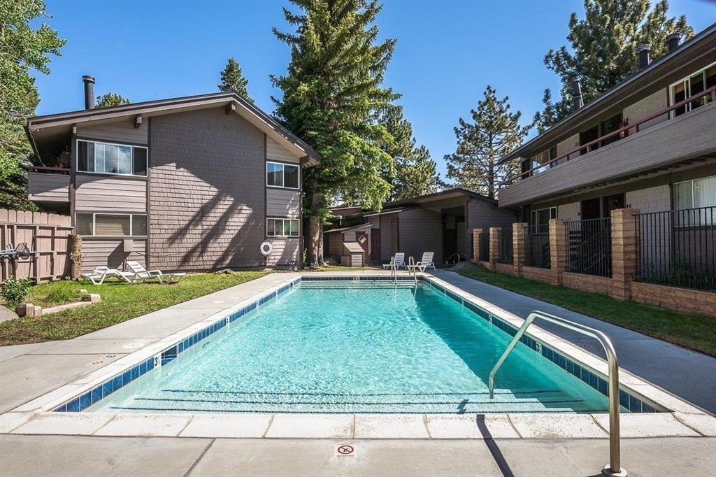 165 Old Mammoth Road, Unit 105 Mammoth Lakes, CA 93546 - Photo 17 of 17 front view of house with a yard