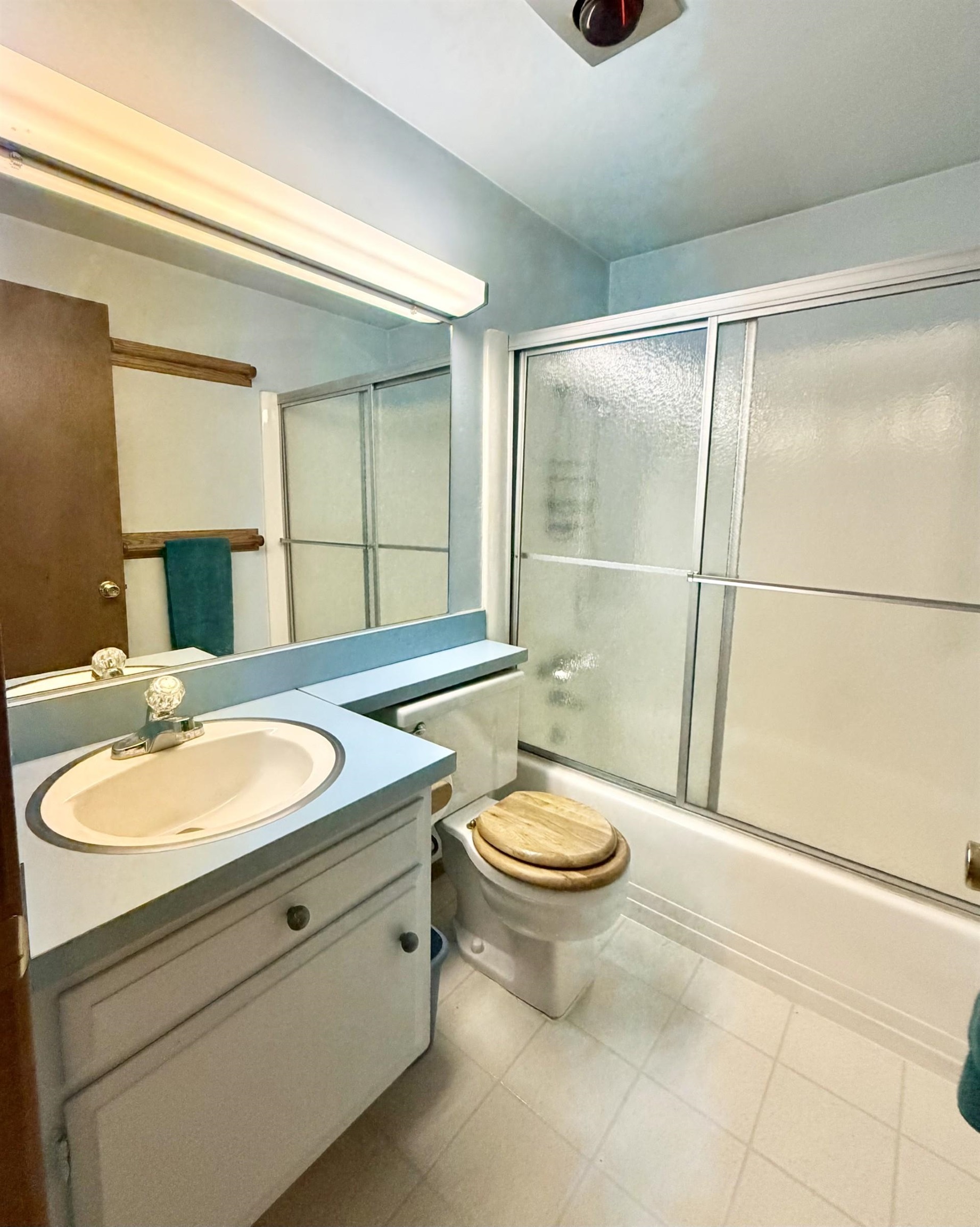 165 Old Mammoth Road, Unit 105 Mammoth Lakes, CA 93546 - Photo 8 of 17 a bathroom with a sink a toilet and shower