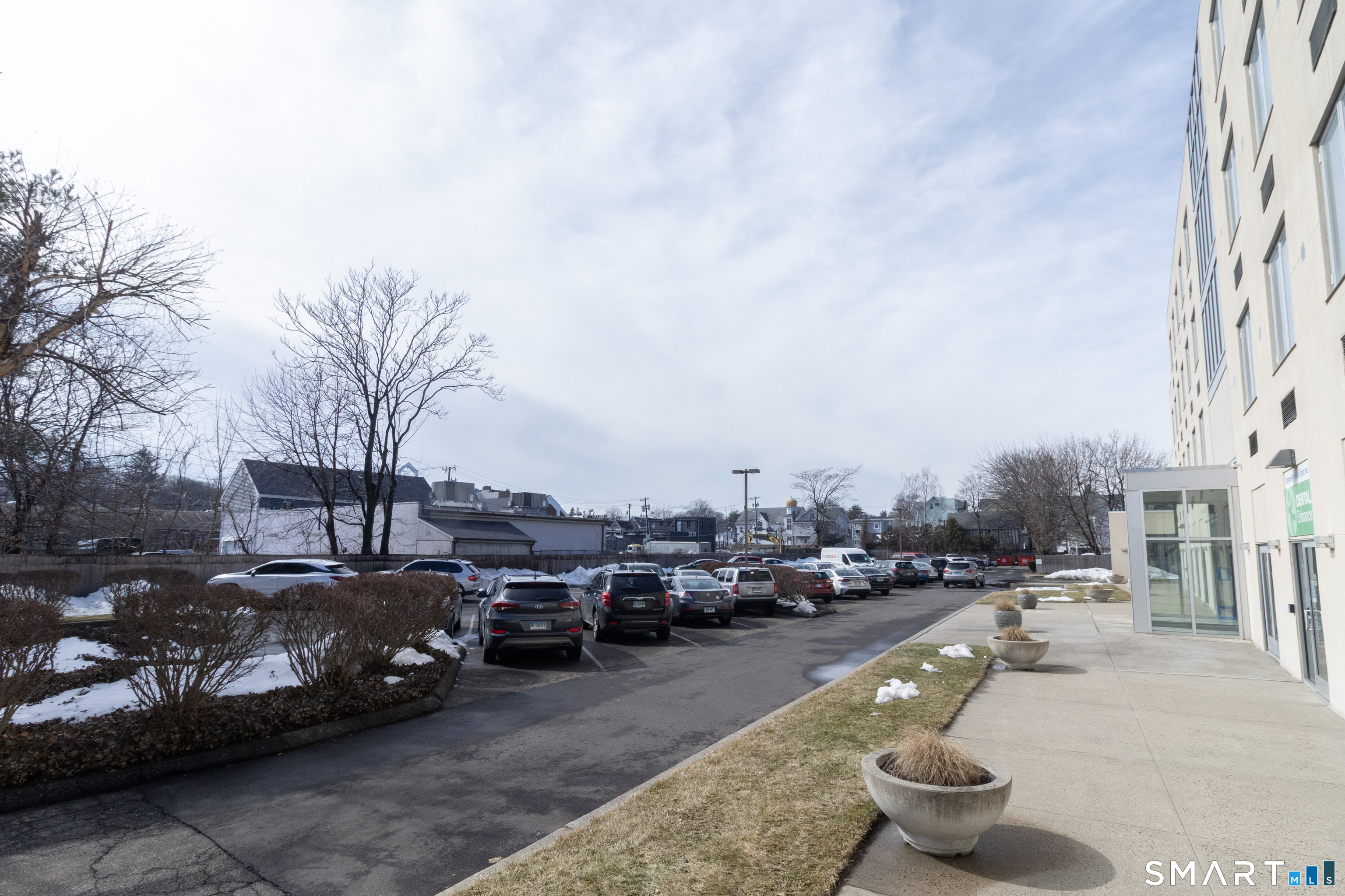 49 Day Street, Unit 209 Norwalk, CT 06854 - Photo 19 of 20 a city street with cars parked