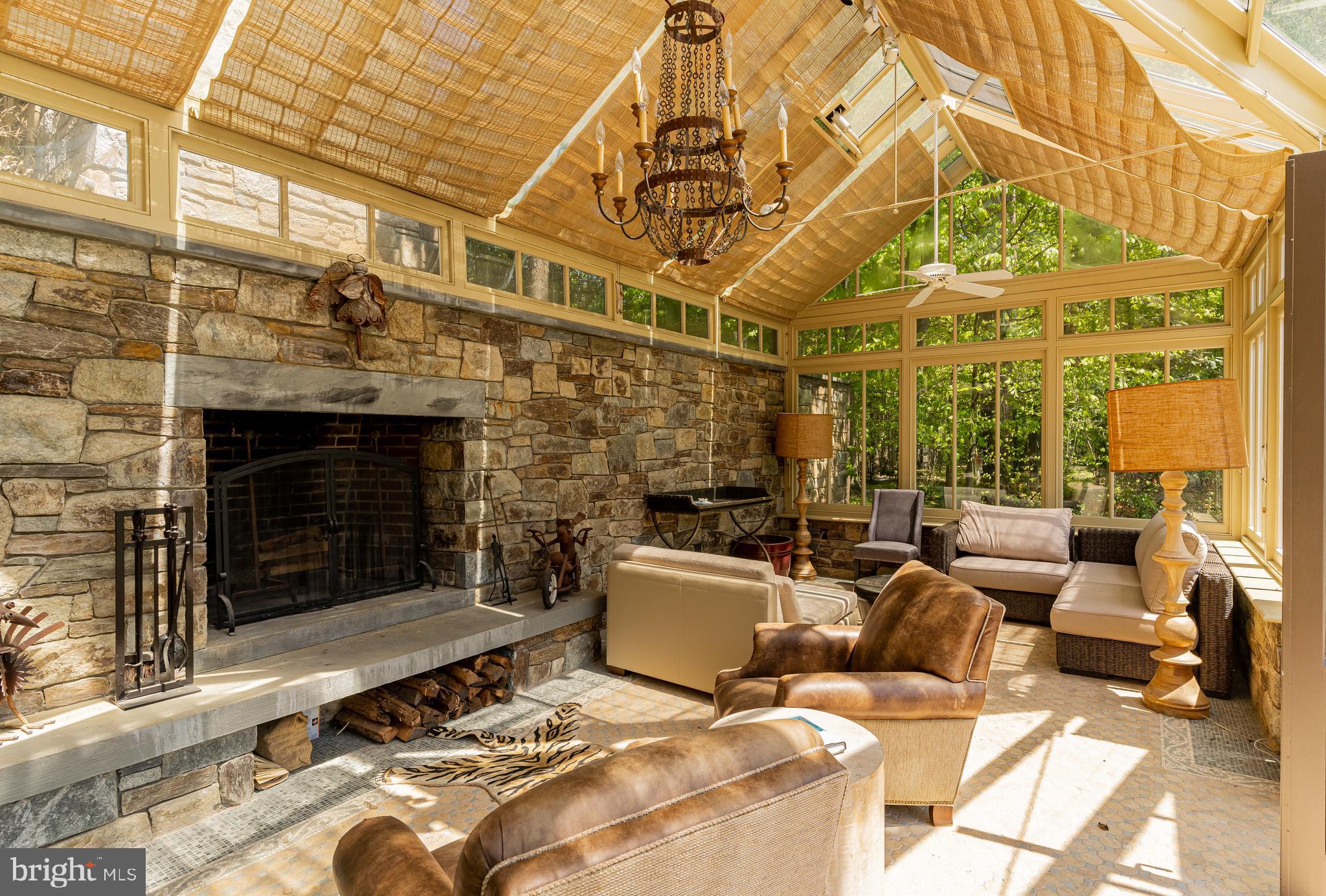 10109 Iron Gate Road Potomac, MD 20854 - Photo 37 of 42 Sun-filled Solarium w/Fireplace