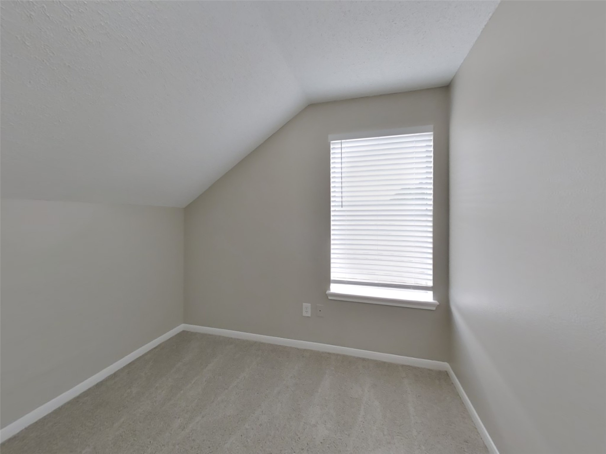 3210 Kelling Street Houston, TX 77045 - Photo 11 of 16 an empty room with a window