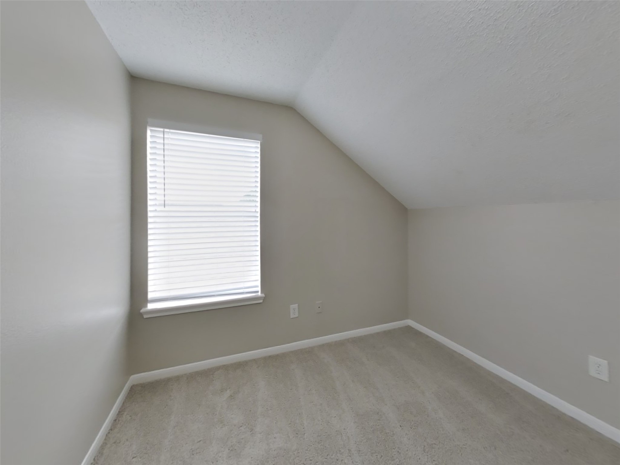 3210 Kelling Street Houston, TX 77045 - Photo 13 of 16 an empty room with a window