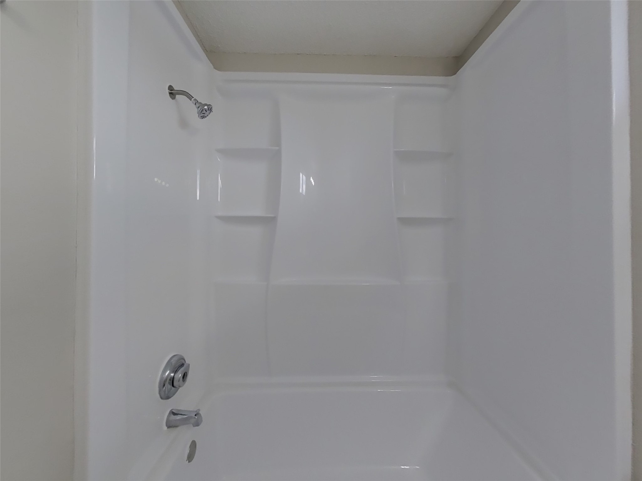 3210 Kelling Street Houston, TX 77045 - Photo 14 of 16 a close up of a shower