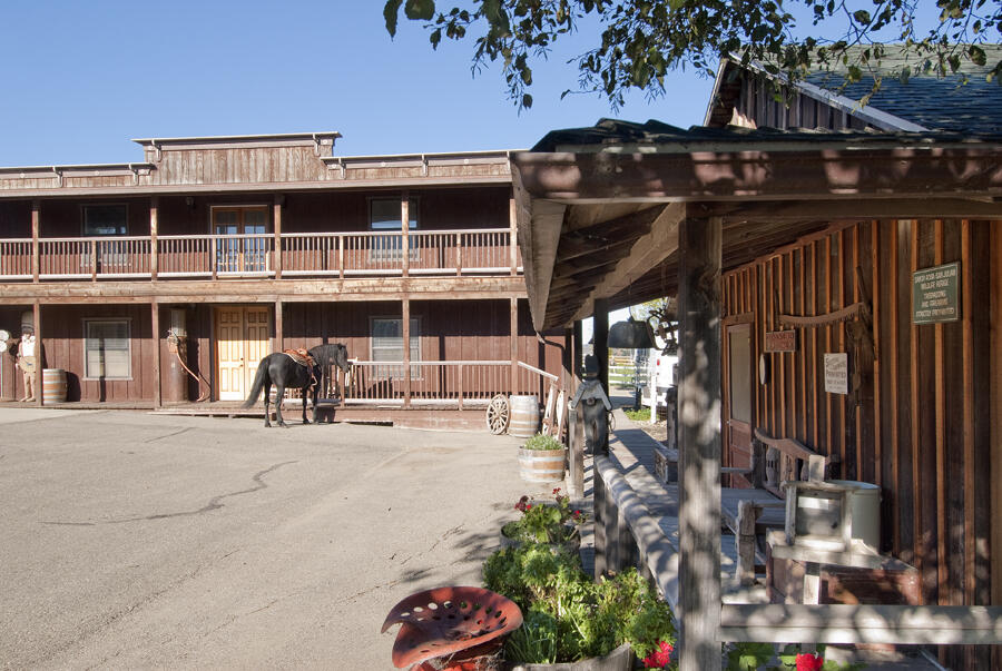 6500 Santa Rosa Road Buellton, CA 93427 - Photo 51 of 96 a view of a house with large windows and a small yard