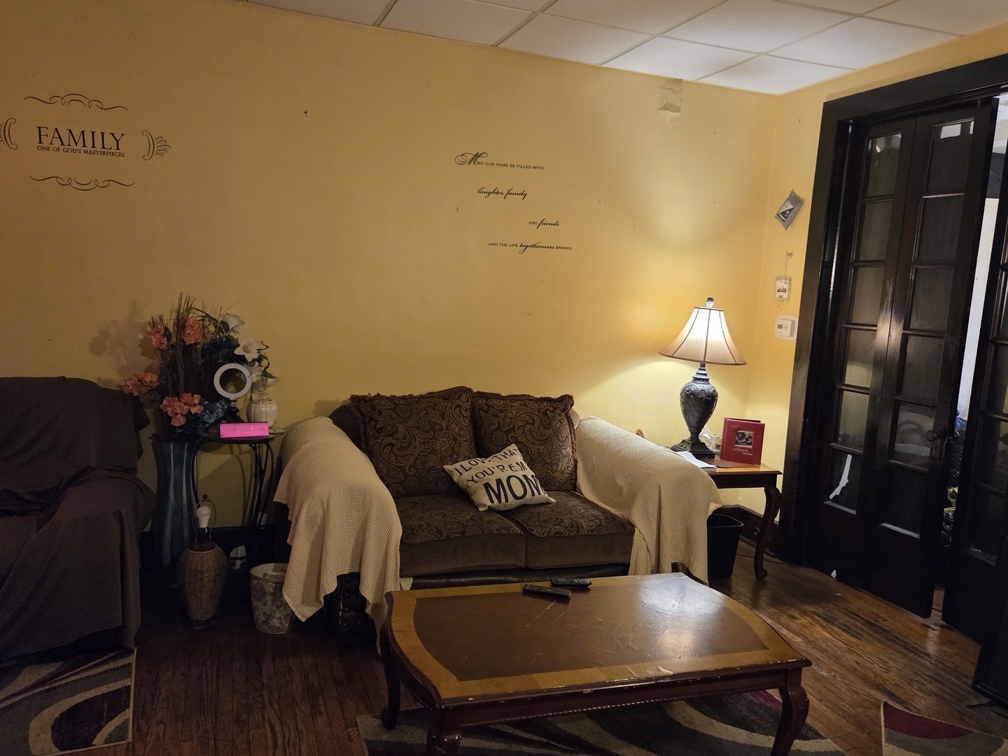 6738 South Normal Boulevard Chicago, IL 60621 - Photo 3 of 12 a living room with furniture and wooden floor