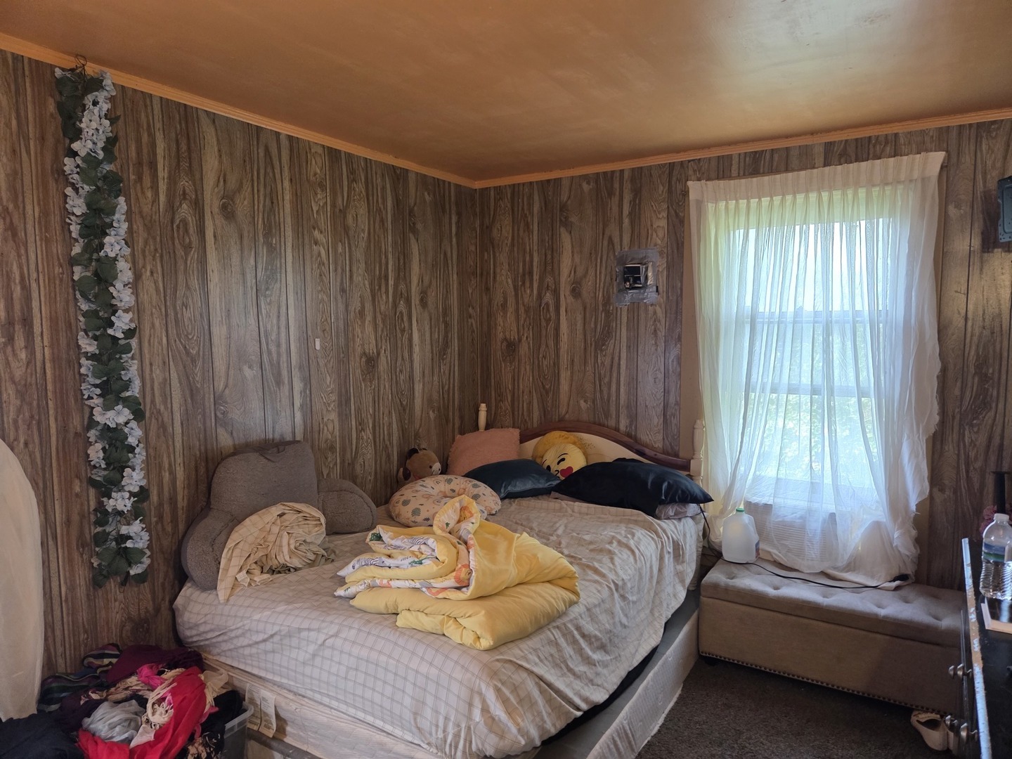 6738 South Normal Boulevard Chicago, IL 60621 - Photo 7 of 12 a bedroom with a bed and a window