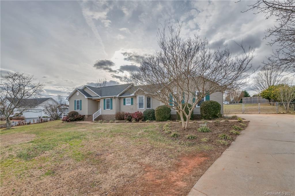 215 Orchard Grove Road, Unit 22 Campobello, SC 29322 - Photo 2 of 35 a view of a house with a yard