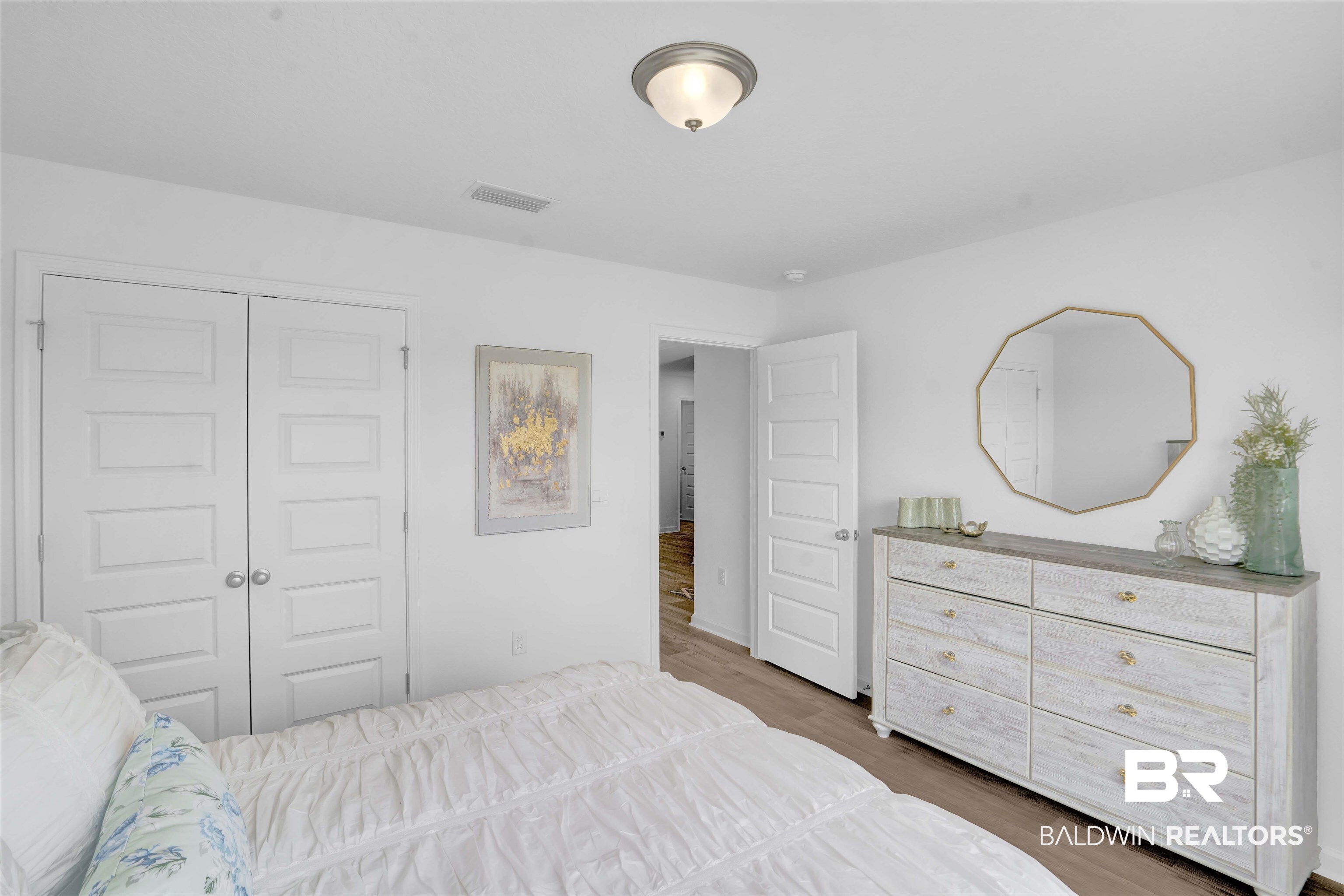 14717 Dayton Circle Foley, AL 36535 - Photo 7 of 39 Bedroom featuring dark hardwood / wood-style floors and a closet