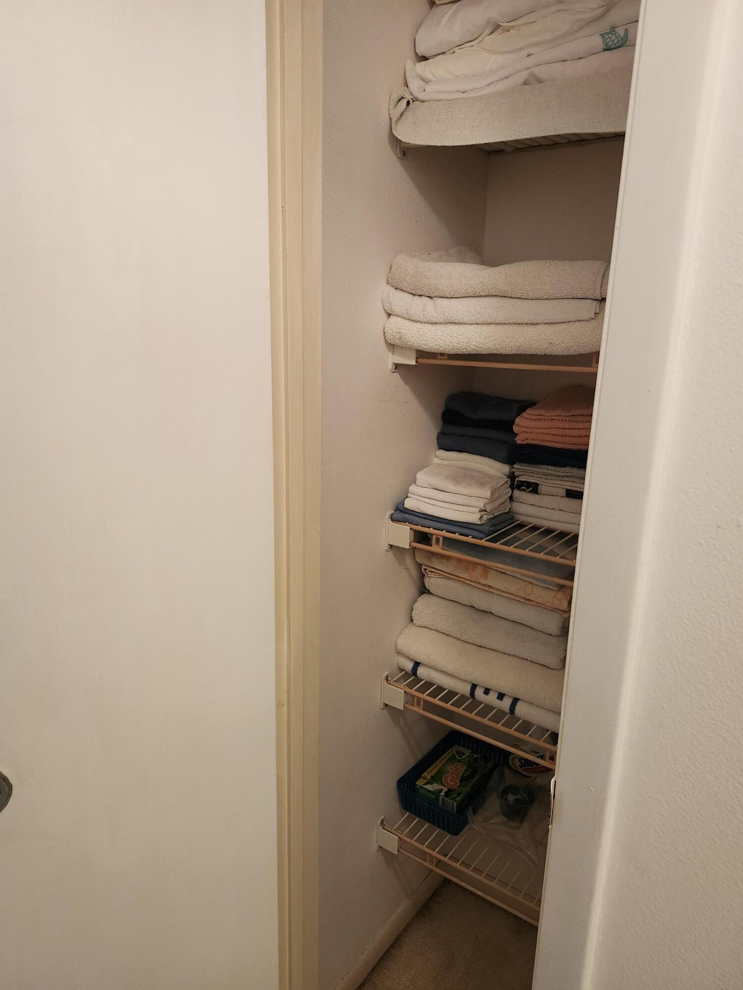 330 Northeast 26th Avenue, Unit 212 Boynton Beach, FL 33435 - Photo 19 of 31 a room with storage and utility