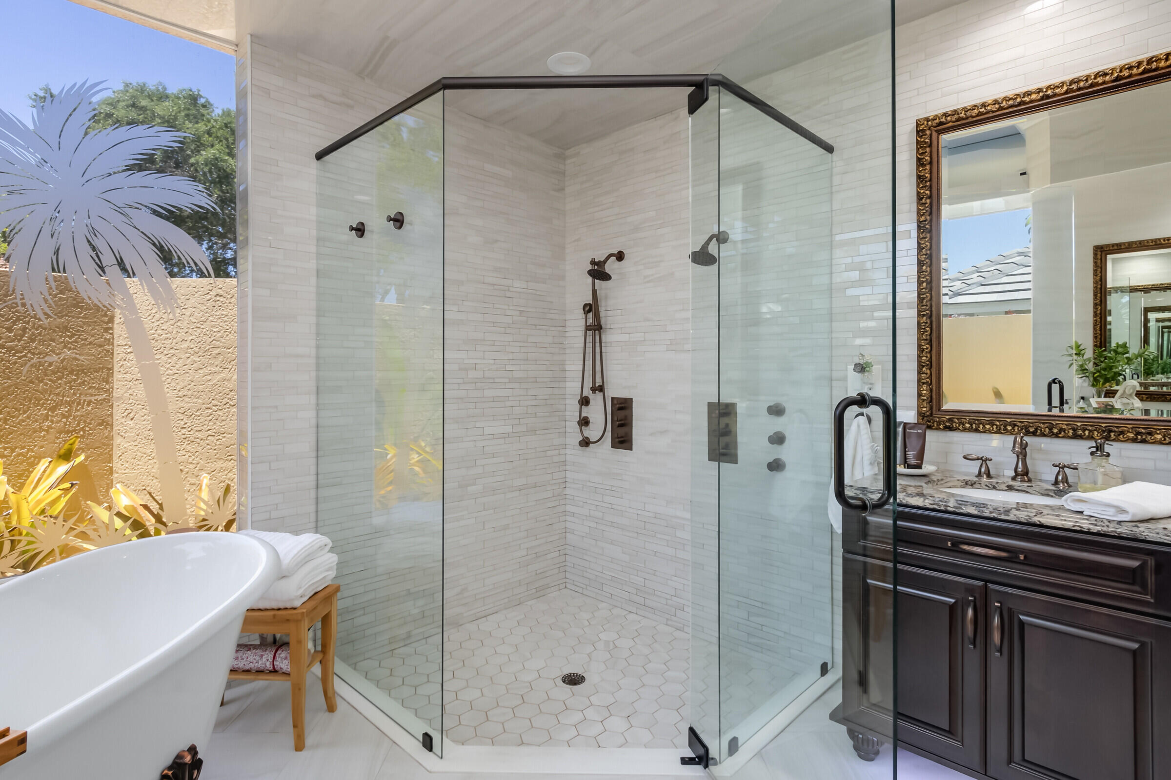 335 Normandy Drive Indialantic, FL 32903 - Photo 13 of 55 a bathroom with a shower sink and mirror