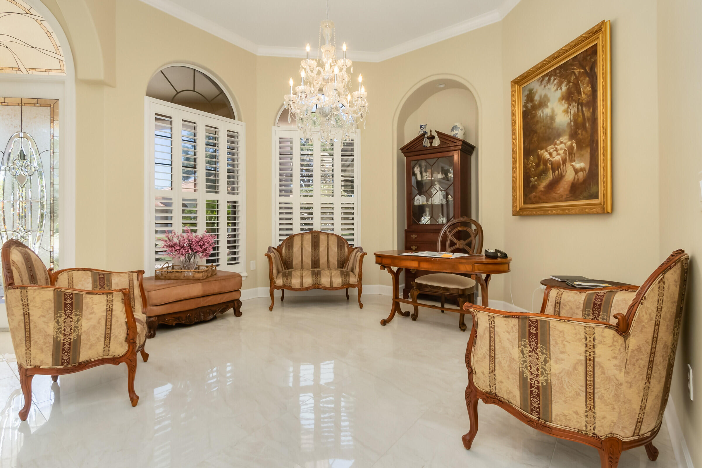 335 Normandy Drive Indialantic, FL 32903 - Photo 18 of 55 a living room with furniture and a chandelier