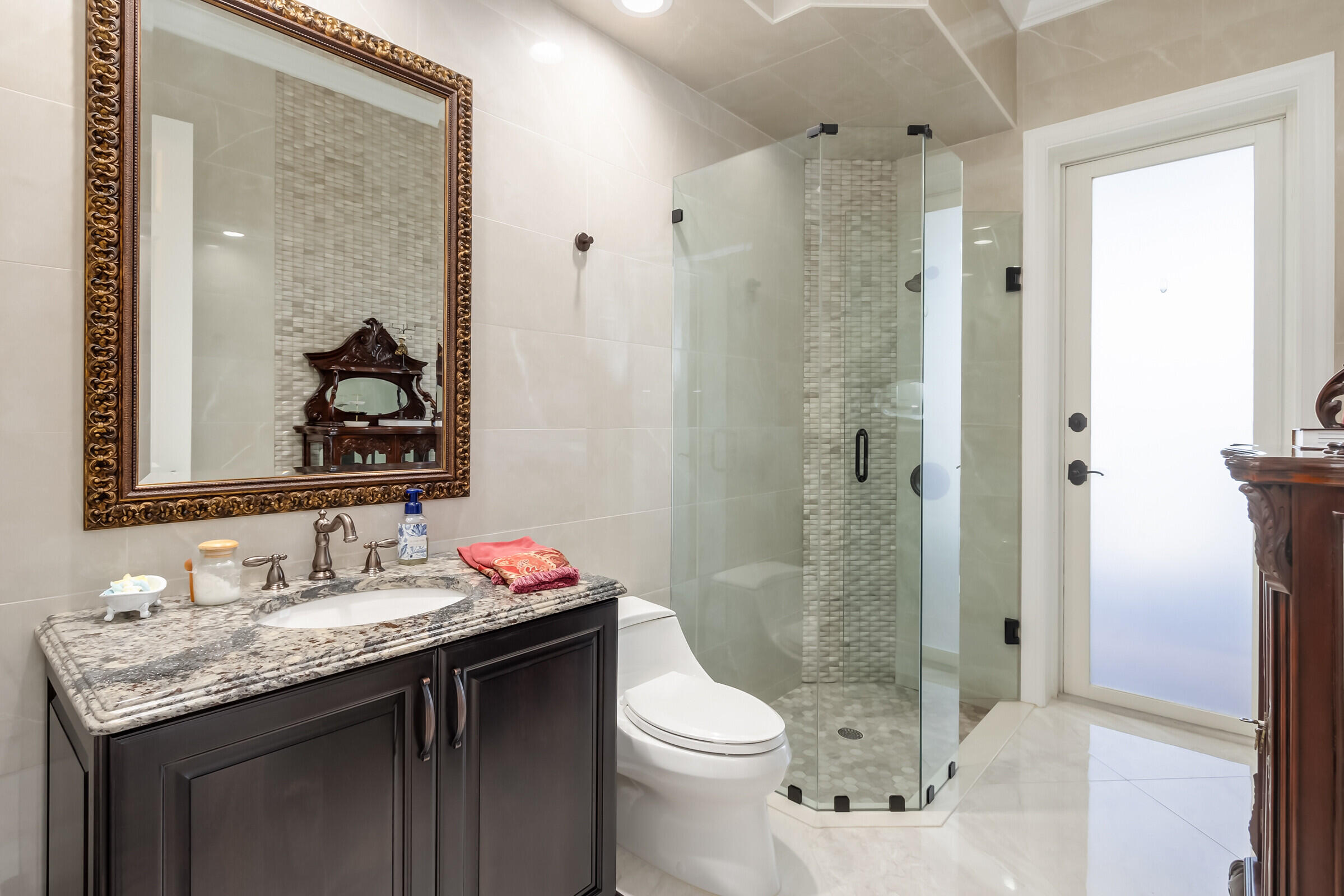 335 Normandy Drive Indialantic, FL 32903 - Photo 28 of 55 a bathroom with a granite countertop sink toilet and shower
