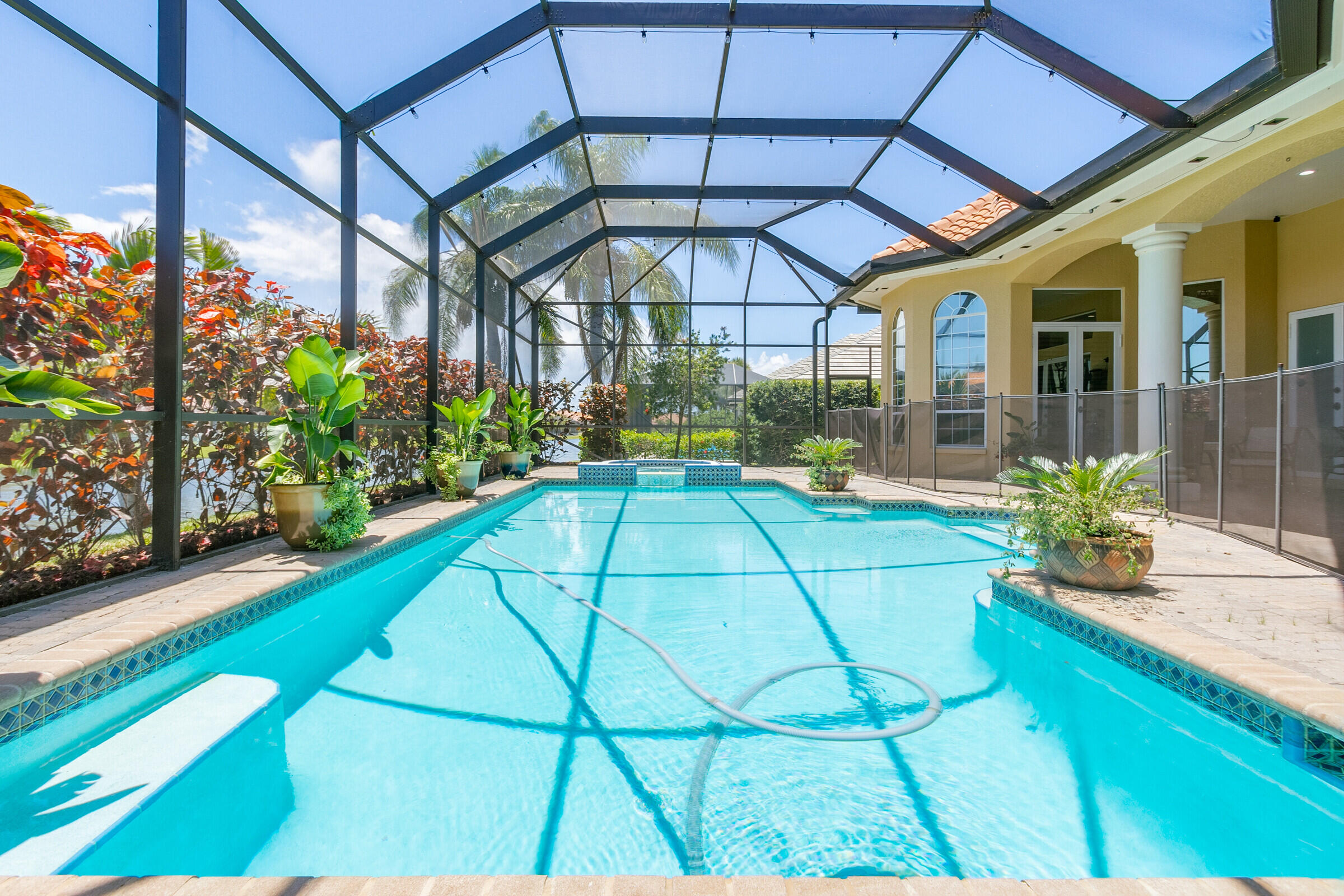 335 Normandy Drive Indialantic, FL 32903 - Photo 34 of 55 a view of a swimming pool with a patio
