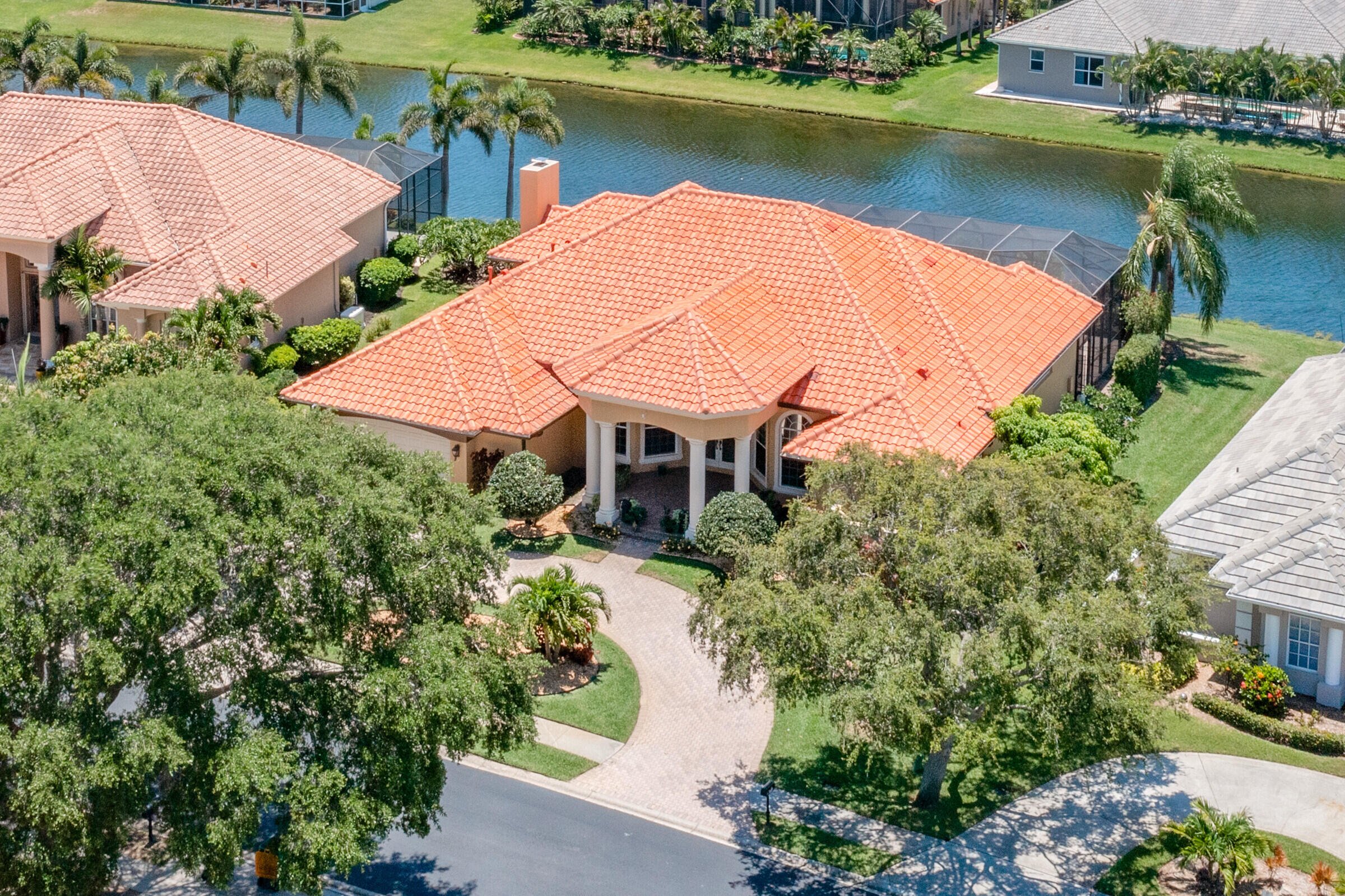 335 Normandy Drive Indialantic, FL 32903 - Photo 46 of 55 an aerial view of a house with a lake view
