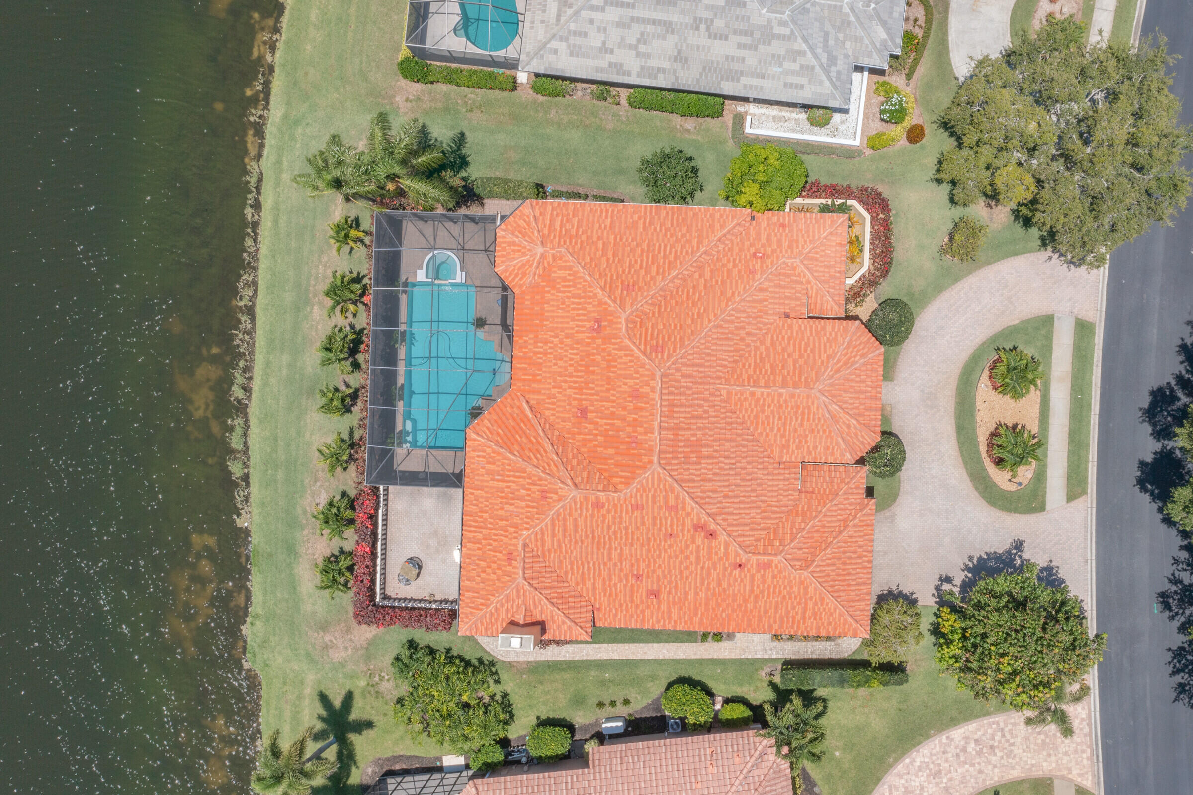 335 Normandy Drive Indialantic, FL 32903 - Photo 48 of 55 an aerial view of a residential apartment building with a yard and plants