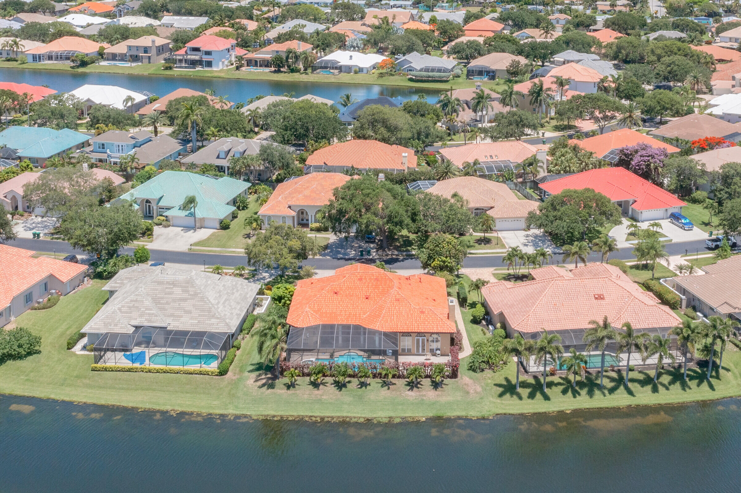 335 Normandy Drive Indialantic, FL 32903 - Photo 52 of 55 an aerial view of residential houses with outdoor space and lake view