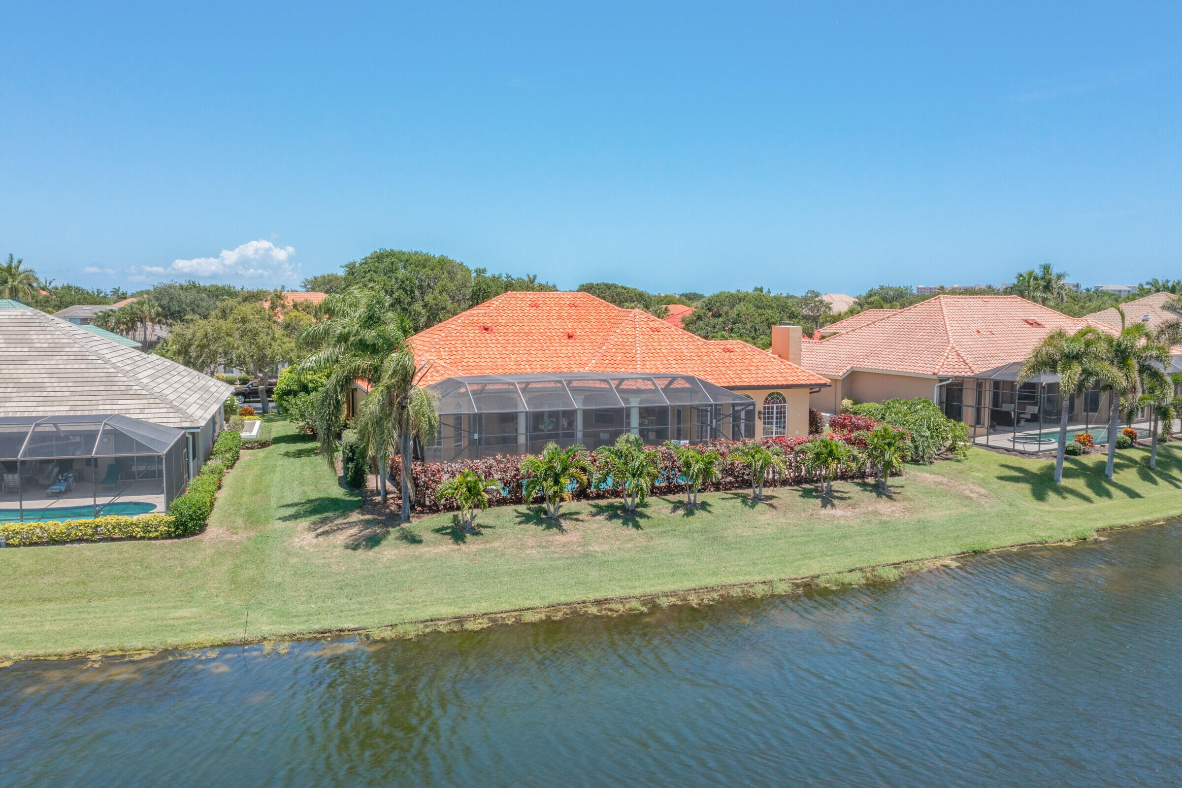 335 Normandy Drive Indialantic, FL 32903 - Photo 54 of 55 a view of a swimming pool with a lake view