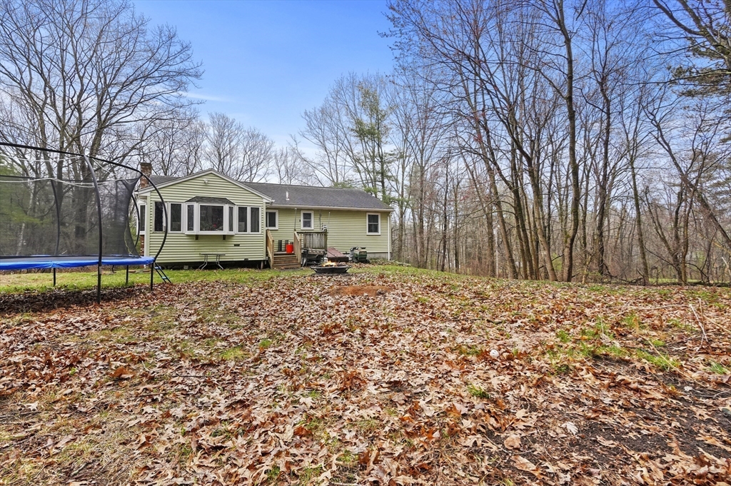 33 Frost Road Derry, NH 03038 - Photo 26 of 30 a front view of a house with a yard