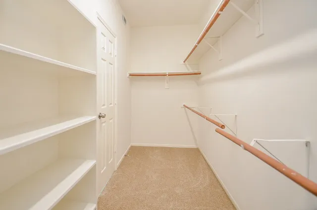 a view of hallway with stairs