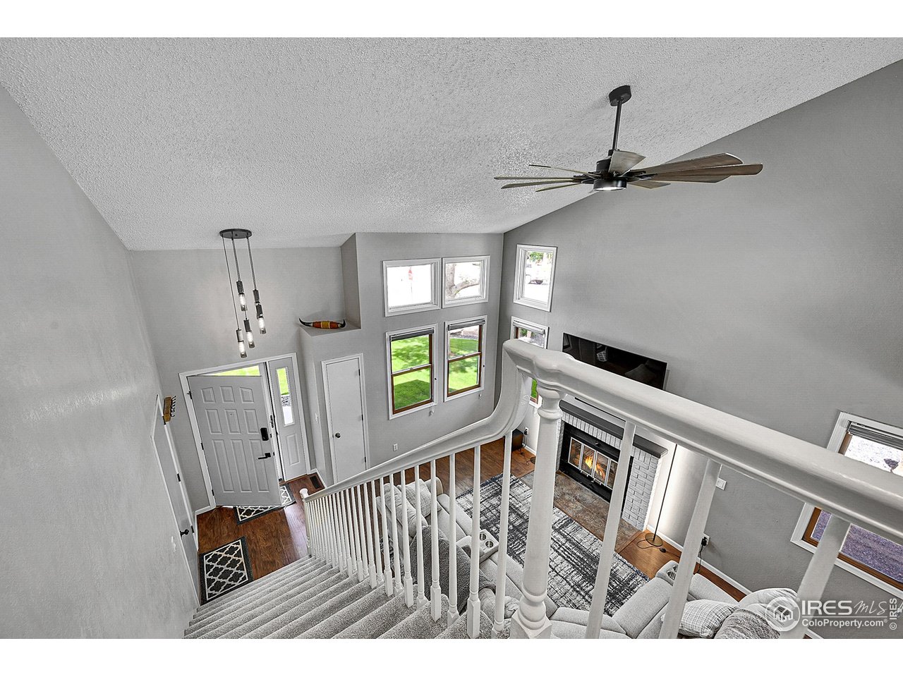 4704 West 6th Street Road Greeley, CO 80634 - Photo 17 of 38 Entry and Living Room Overlook