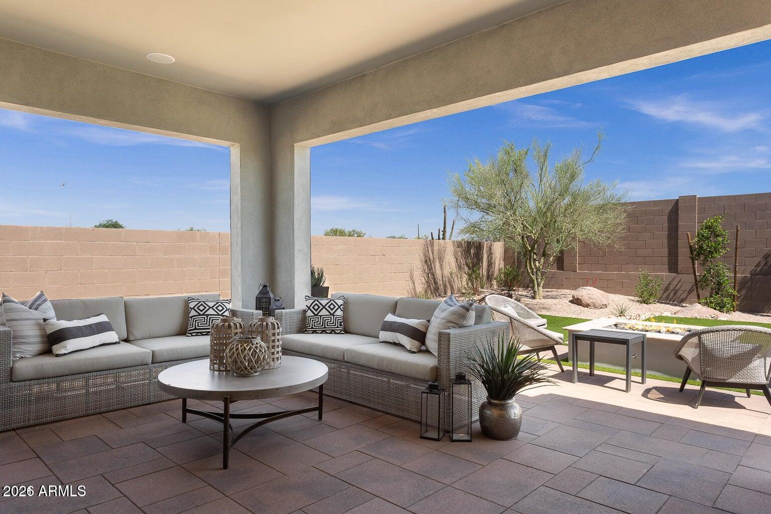 4412 East Roy Rogers Road Cave Creek, AZ 85331 - Photo 7 of 40 a living room with furniture and a large window