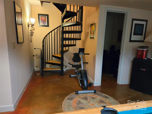 a view of entryway with wooden floor