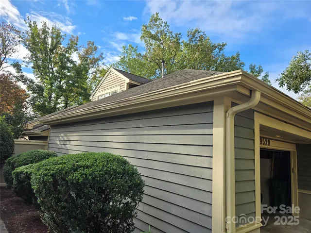 a house view with a backyard space