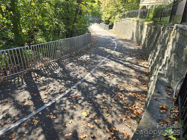 a view of balcony with wooden floor