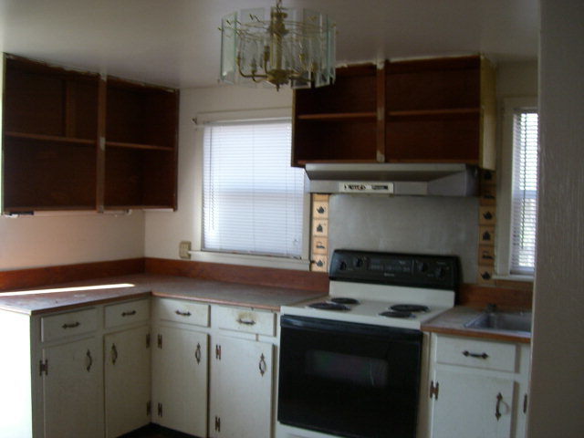 851 Cumslo Road Gray, GA 31032 - Photo 6 of 17 a kitchen with a stove and a microwave