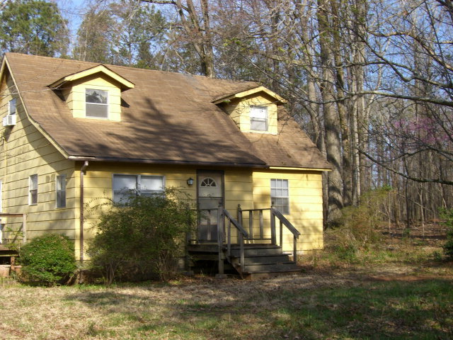 851 Cumslo Road Gray, GA 31032 - Photo 10 of 17 a front view of a house with a yard