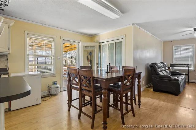 a view of a dining room with furniture