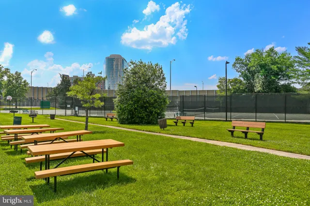 a view of a yard with a swimming pool