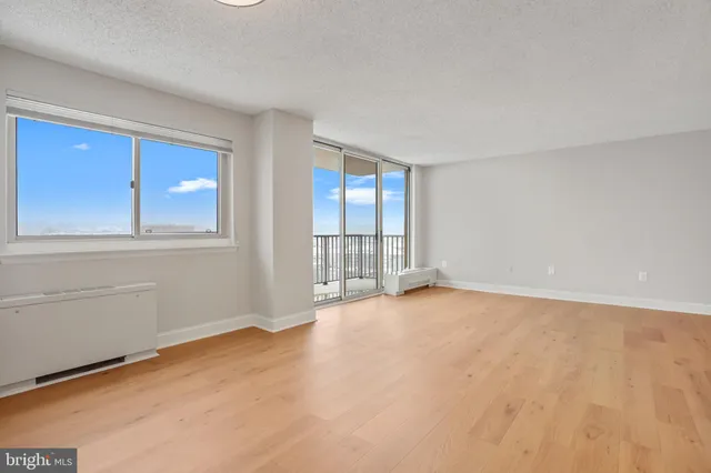 an empty room with windows