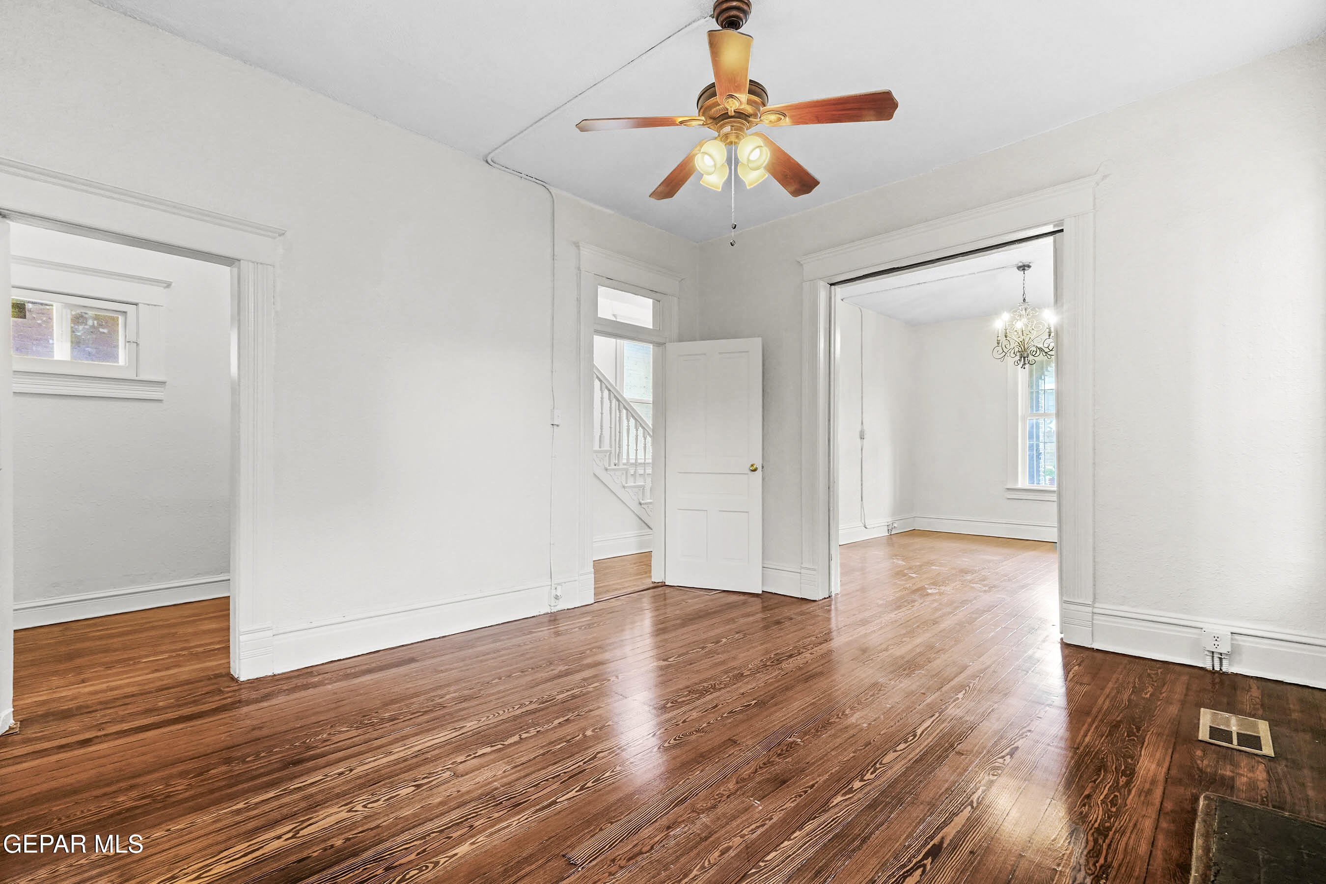 215 West Rio Grande Avenue El Paso, TX 79902 - Photo 18 of 62 wooden floor in an empty room with a window