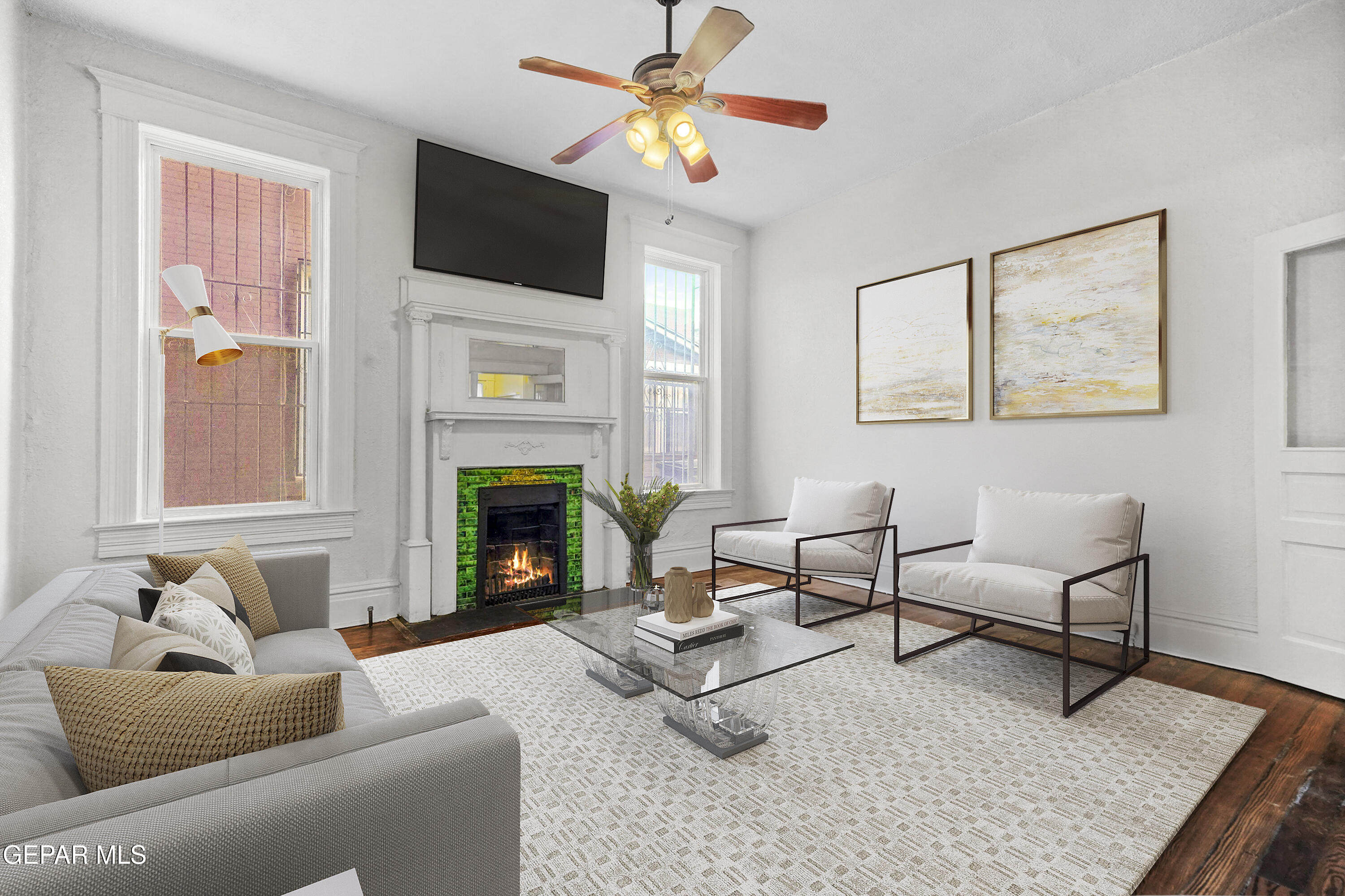 215 West Rio Grande Avenue El Paso, TX 79902 - Photo 19 of 62 a living room with furniture and a fireplace