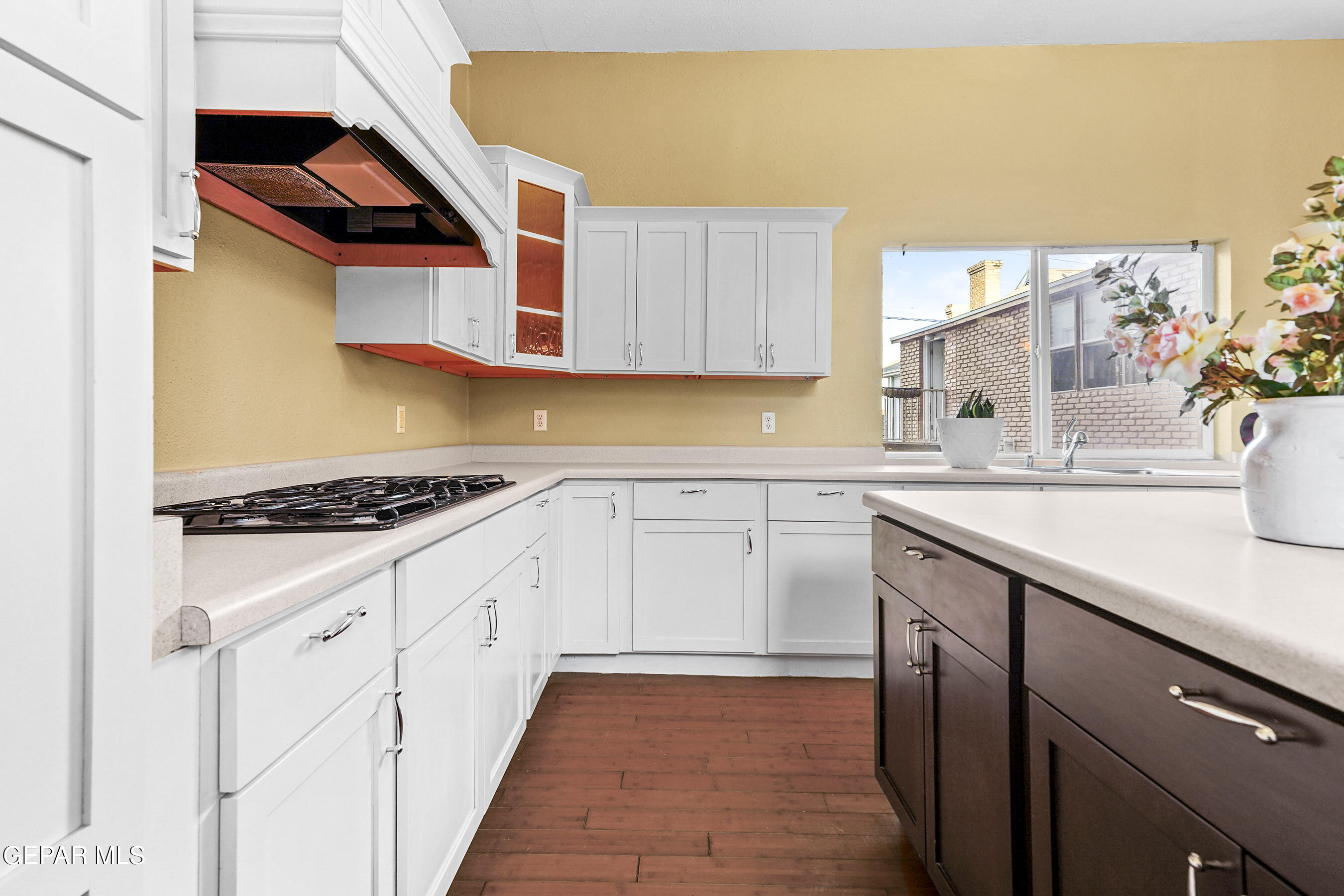 215 West Rio Grande Avenue El Paso, TX 79902 - Photo 29 of 62 a kitchen with stainless steel appliances granite countertop a sink and cabinets