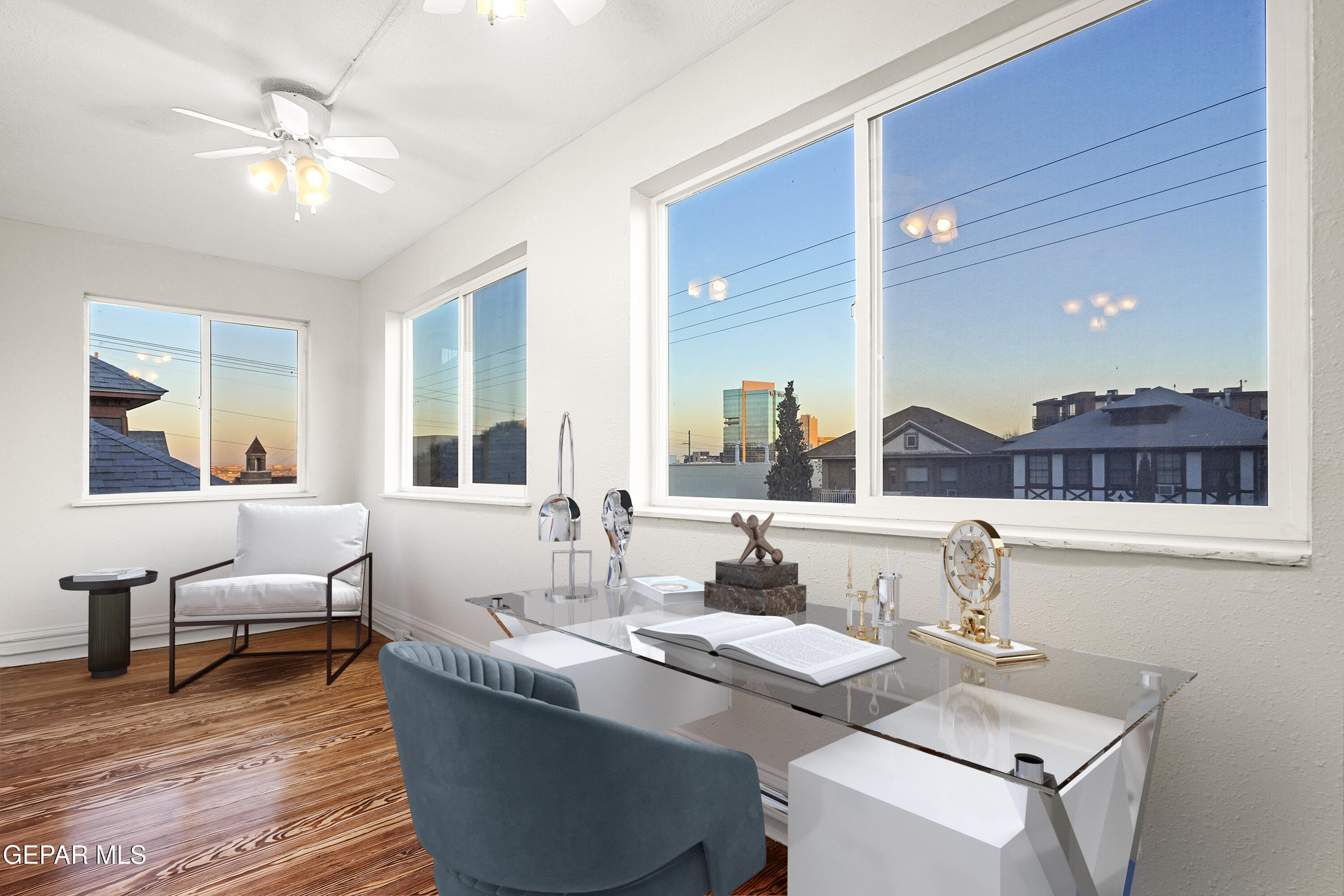 215 West Rio Grande Avenue El Paso, TX 79902 - Photo 36 of 62 a living room with couches and kitchen view with wooden floor