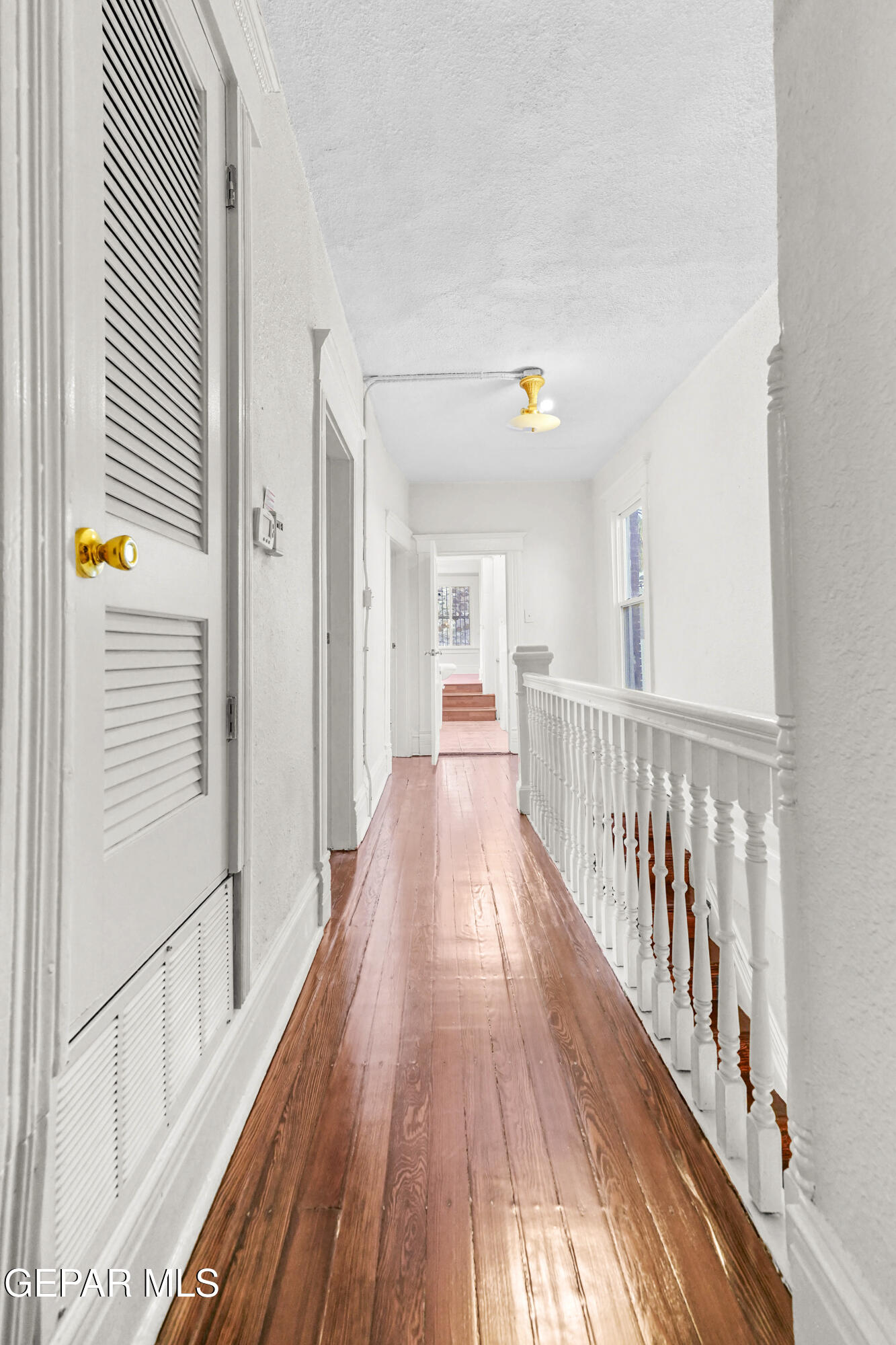 215 West Rio Grande Avenue El Paso, TX 79902 - Photo 43 of 62 a view of a hallway with wooden floor