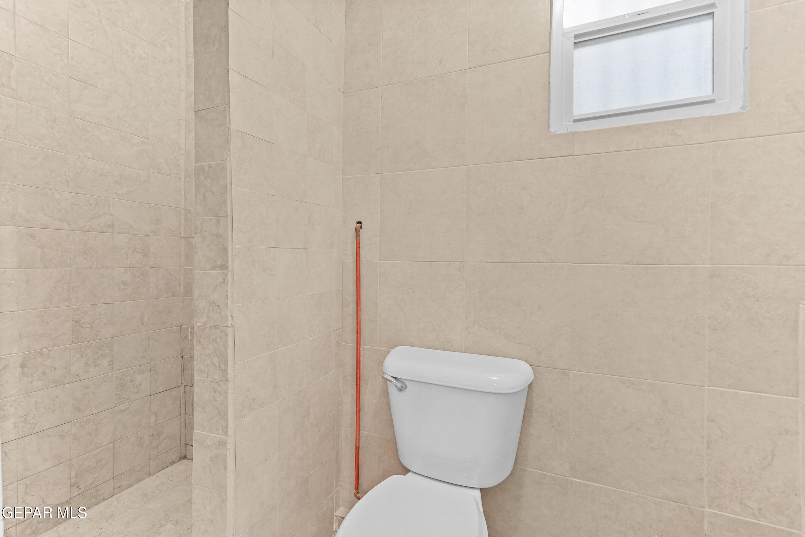 215 West Rio Grande Avenue El Paso, TX 79902 - Photo 53 of 62 a white toilet sitting next to a white wall