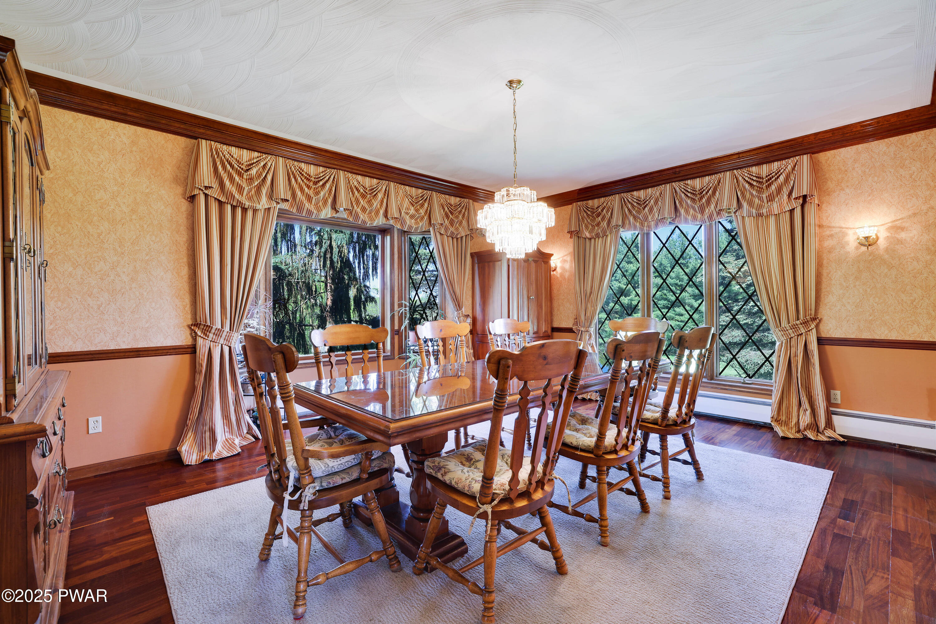 555 Valley View Road Dallas, PA 18612 - Photo 25 of 99 a view of a dining room with furniture window and wooden floor