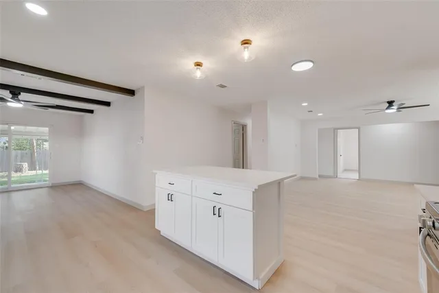 a front view of house with yard and outdoor seating