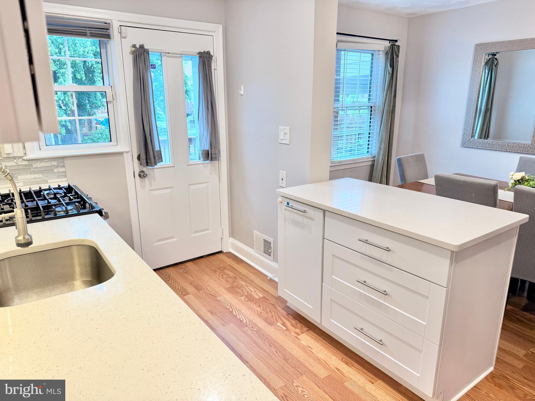 2235 Southorn Road Baltimore, MD 21220 - Photo 3 of 33 a bedroom with a bed and a sink