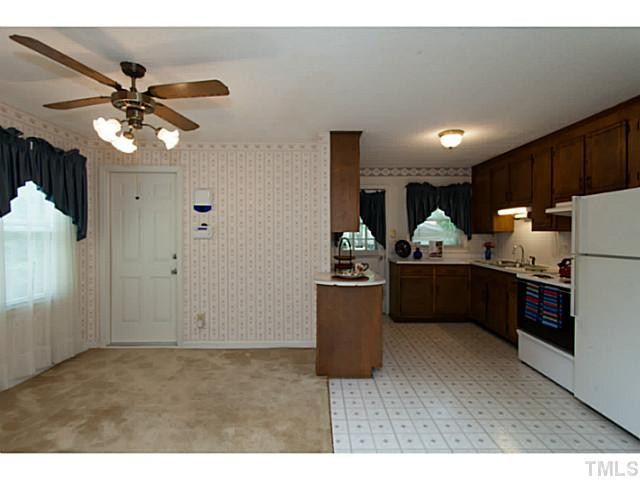 2468 Milburnie Road Raleigh, NC 27610 - Photo 8 of 25 a view of kitchen with cabinets